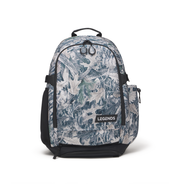 Brazer backpack in forest camouflage pattern with sage and black colorway, featuring side pockets and top carry handle.