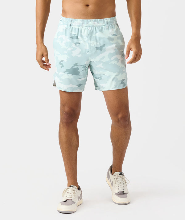 Men's golf shorts in light blue with gray camouflage pattern and elastic waistband.