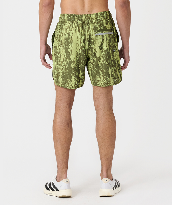 Men's shorts in light green and olive textured pattern with elastic waistband and side pocket.