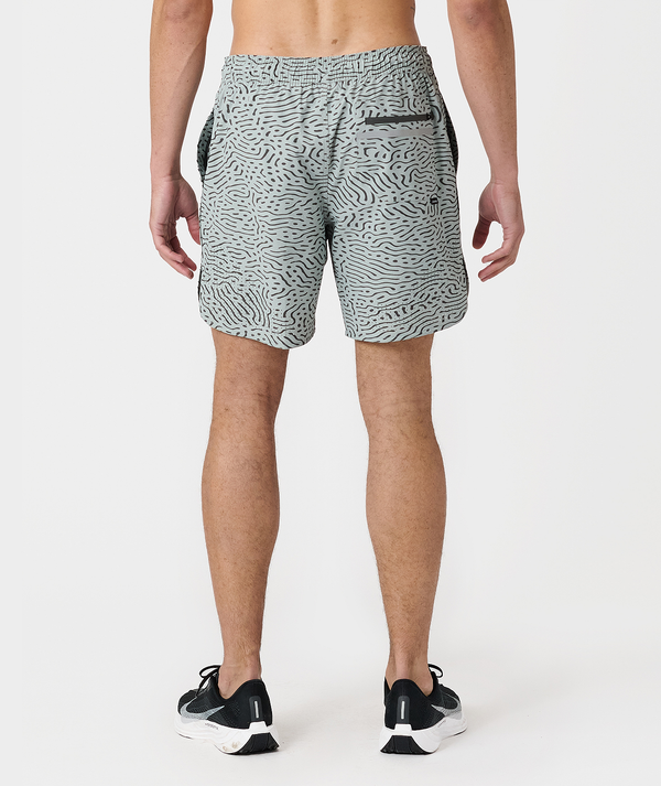 Men's charcoal maze-patterned athletic shorts with side pockets, shown from back view.
