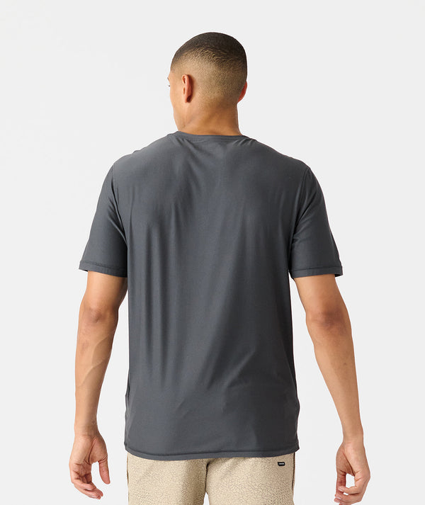 Man wearing charcoal gray short-sleeve t-shirt, shown from back view.