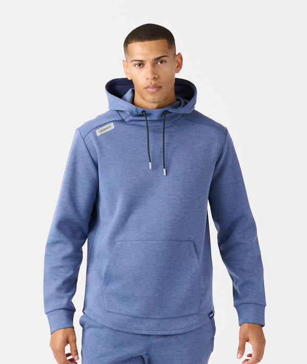Hawthorne Tech Hoodie in heather blue with drawstring hood, front pocket, and navy inner lining.