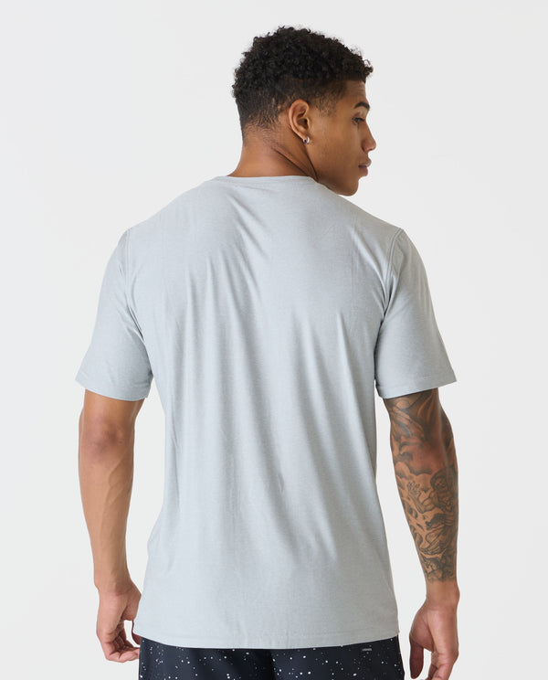 Heather gray short-sleeve t-shirt with crew neckline, shown from back on model.