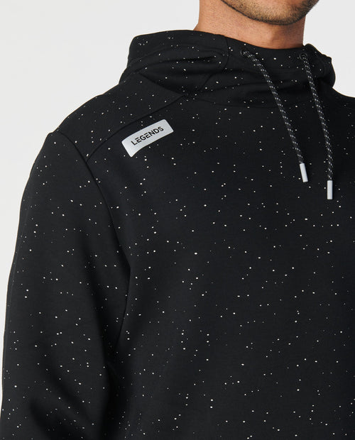 Black hoodie with white speckled splatter pattern, white drawstrings, and "LEGENDS" chest label.